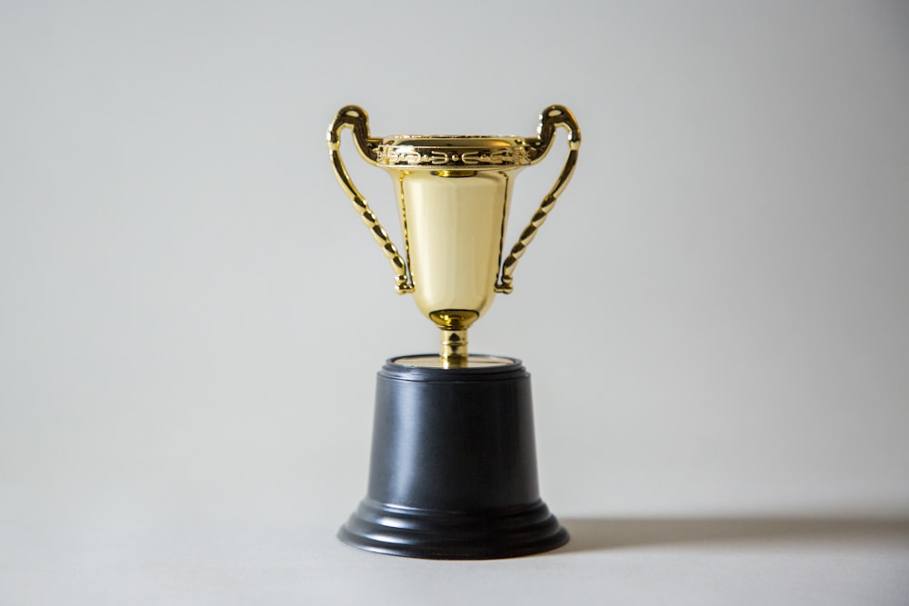 Piala emas sebagai ilustrasi rebate turnover harian 29Hoki